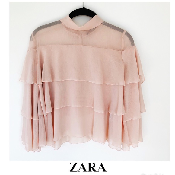 pink blouse with ruffles